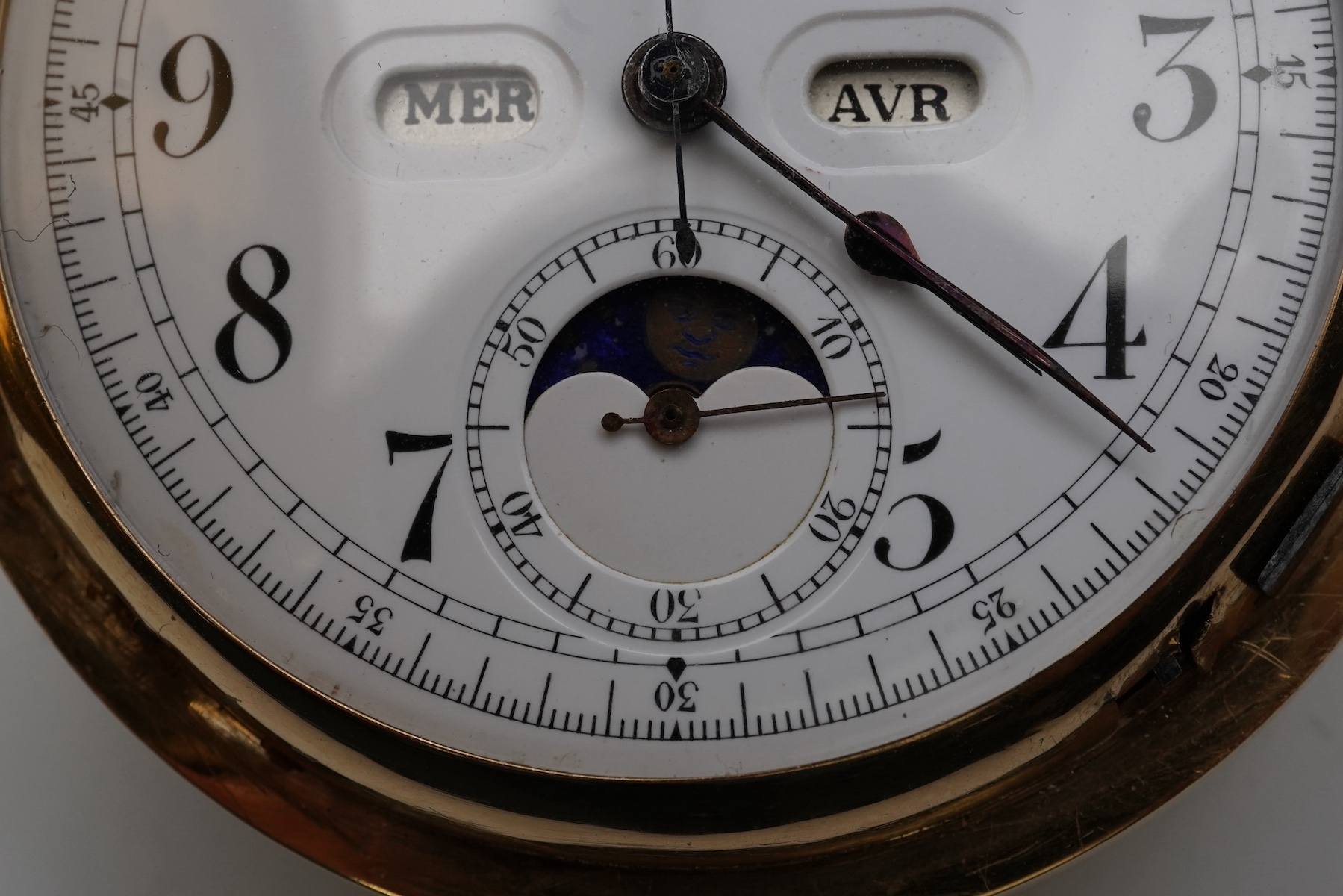 An 18k gold keyless wind triple calendar minute repeating chronograph full hunter pocket watch with moon phase